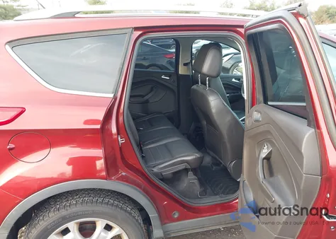 2015 Ford Escape Titanium z USA, uszkodzony, nr VIN 1FMCU9J92FUC72288